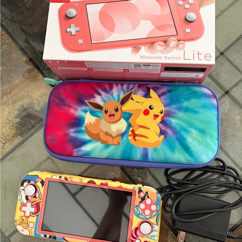 Nintendo Switch Lite Coral with Pokémon Design